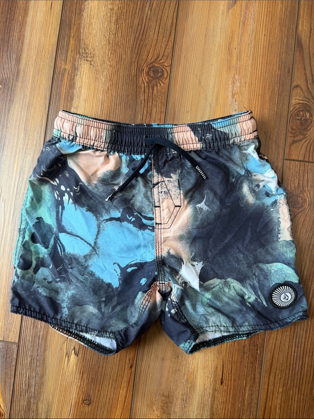 Volcom boys Abstract Tie-Dye Swim Trunks in Teal, Black & Peach